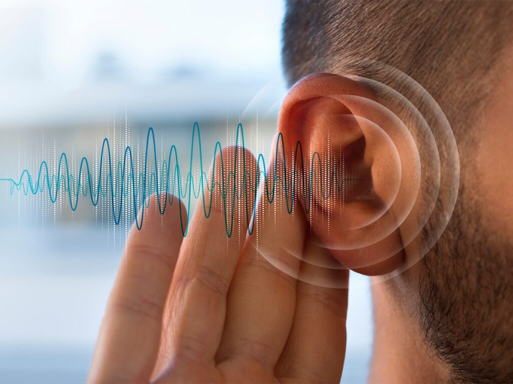 person having hearing issues concept with frequency graph